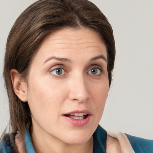 Neutral white young-adult female with medium  brown hair and grey eyes