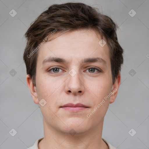 Neutral white young-adult male with short  brown hair and grey eyes