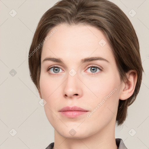 Neutral white young-adult female with medium  brown hair and grey eyes