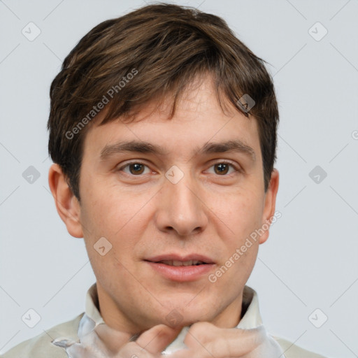 Joyful white young-adult male with short  brown hair and brown eyes