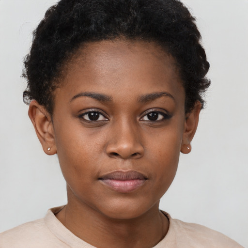 Neutral black young-adult female with short  brown hair and brown eyes