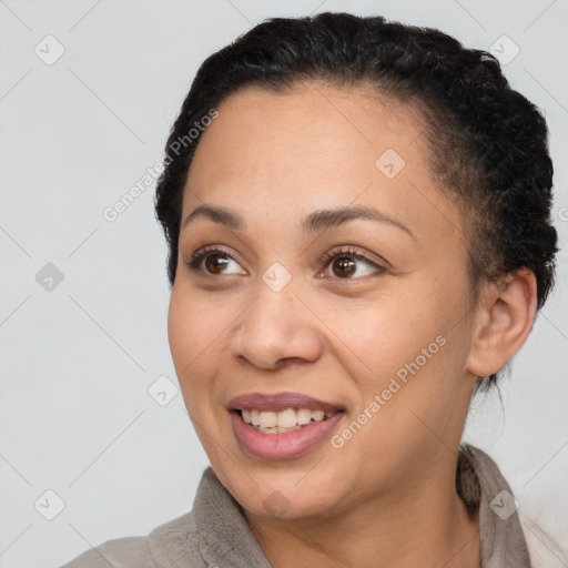 Joyful white adult female with short  brown hair and brown eyes