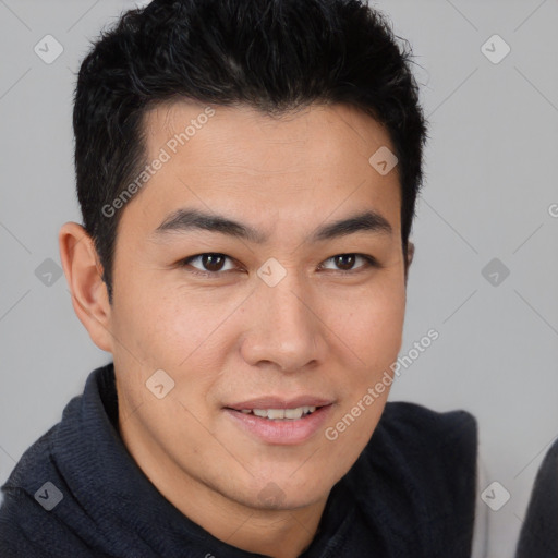 Joyful latino young-adult male with short  brown hair and brown eyes