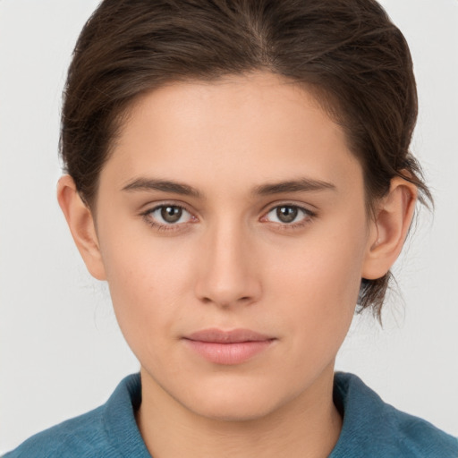 Neutral white young-adult female with medium  brown hair and brown eyes