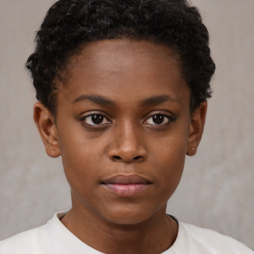 Neutral black child female with short  brown hair and brown eyes