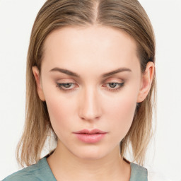 Neutral white young-adult female with medium  brown hair and blue eyes