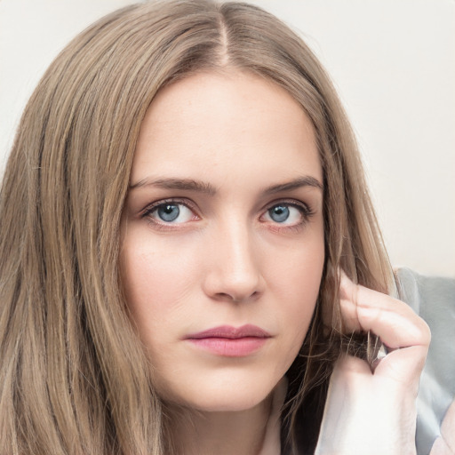 Neutral white young-adult female with long  brown hair and grey eyes