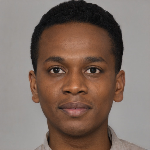 Neutral black young-adult male with short  brown hair and brown eyes