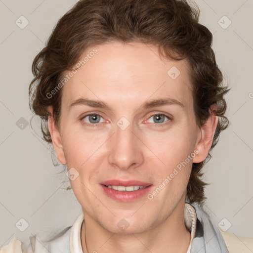 Joyful white young-adult female with medium  brown hair and blue eyes