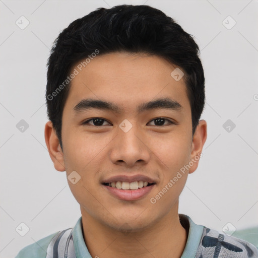 Joyful asian young-adult male with short  black hair and brown eyes