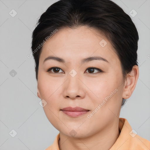 Joyful asian young-adult female with short  brown hair and brown eyes