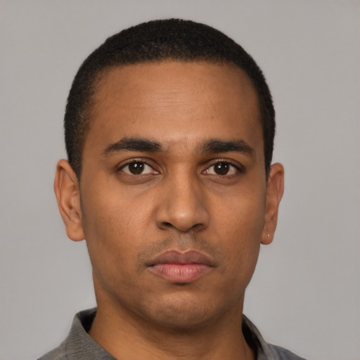 Neutral latino young-adult male with short  brown hair and brown eyes
