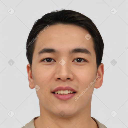 Joyful asian young-adult male with short  black hair and brown eyes