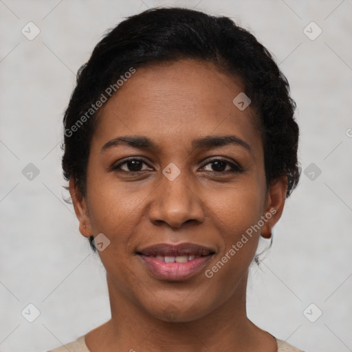 Joyful black young-adult female with short  brown hair and brown eyes