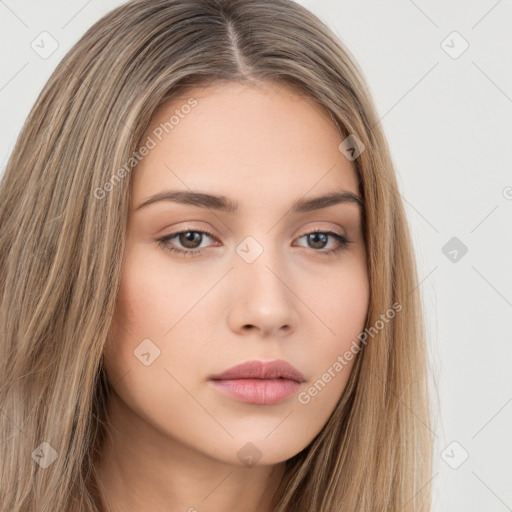 Neutral white young-adult female with long  brown hair and brown eyes