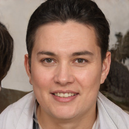 Joyful white adult female with medium  brown hair and brown eyes