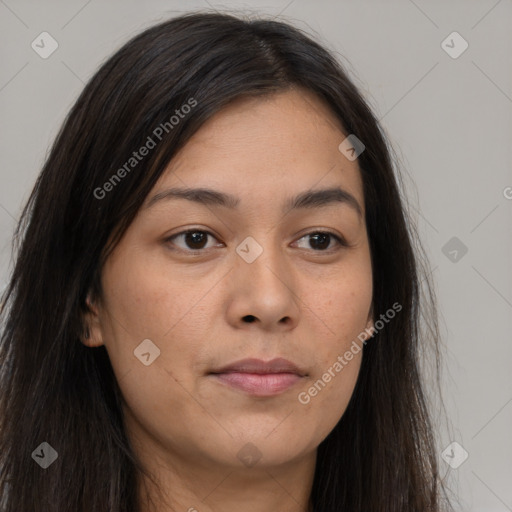 Joyful asian young-adult female with long  brown hair and brown eyes