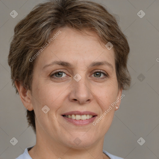 Joyful white adult female with short  brown hair and brown eyes