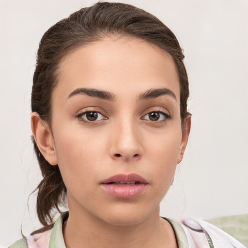 Neutral white young-adult female with medium  brown hair and brown eyes