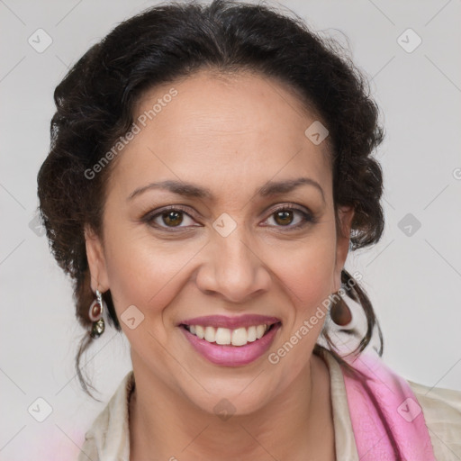 Joyful latino adult female with medium  brown hair and brown eyes