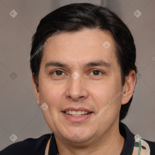 Joyful white adult male with short  brown hair and brown eyes