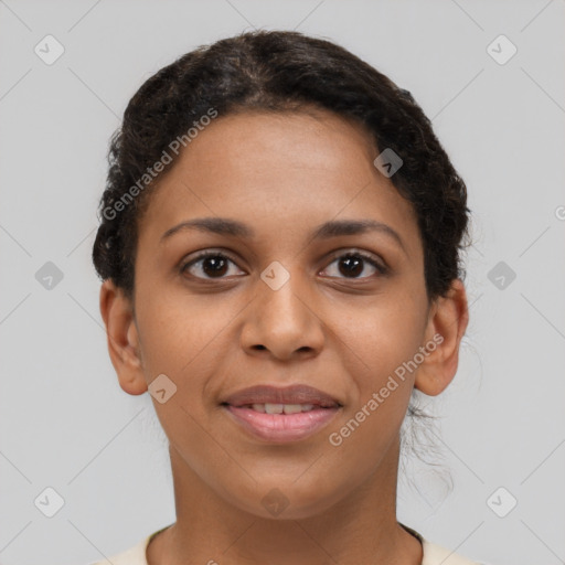 Joyful latino young-adult female with short  brown hair and brown eyes