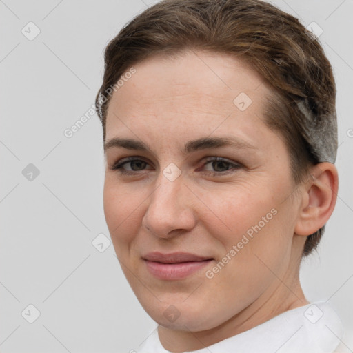 Joyful white young-adult female with short  brown hair and brown eyes