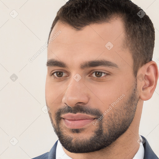 Joyful white young-adult male with short  brown hair and brown eyes