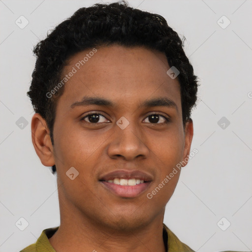 Joyful black young-adult male with short  brown hair and brown eyes