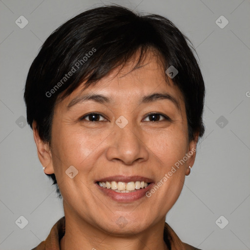 Joyful white adult female with medium  brown hair and brown eyes