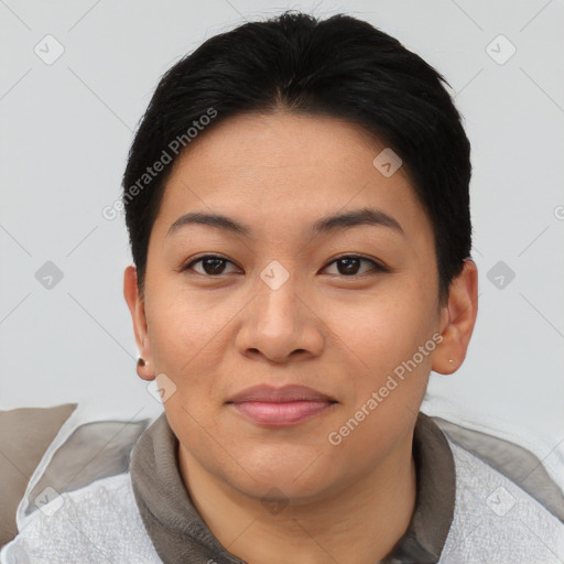 Joyful asian young-adult female with short  black hair and brown eyes