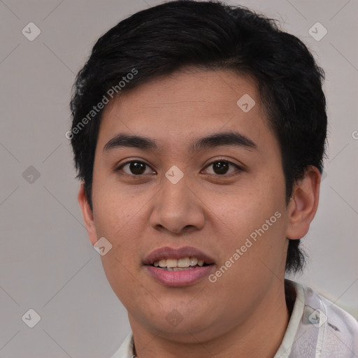 Joyful asian young-adult male with short  brown hair and brown eyes