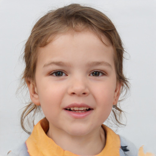 Joyful white child female with medium  brown hair and brown eyes