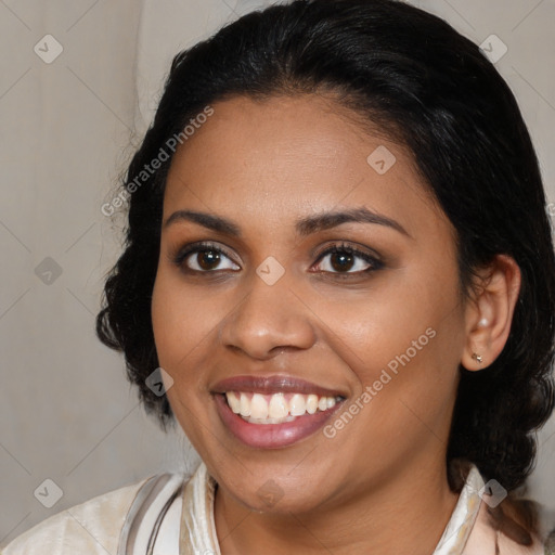 Joyful black young-adult female with medium  brown hair and brown eyes