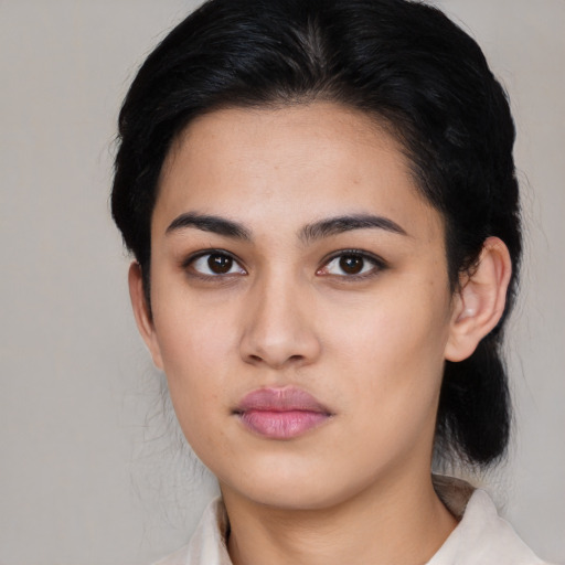 Neutral latino young-adult female with medium  black hair and brown eyes