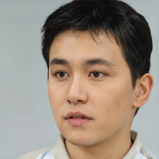 Neutral asian young-adult male with short  brown hair and brown eyes