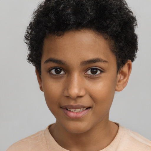 Joyful black child female with short  brown hair and brown eyes