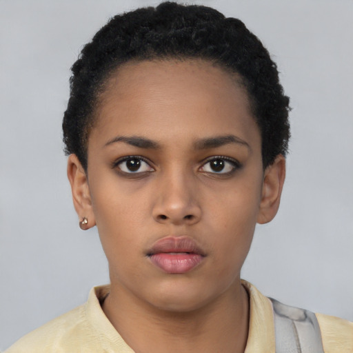 Neutral latino young-adult female with short  black hair and brown eyes