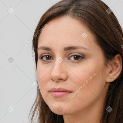 Neutral white young-adult female with long  brown hair and brown eyes