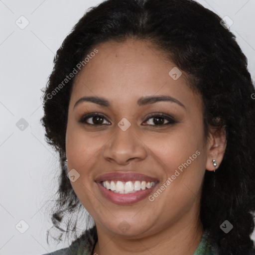 Joyful latino young-adult female with long  brown hair and brown eyes