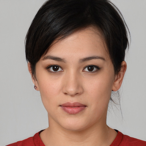 Neutral white young-adult female with medium  black hair and brown eyes