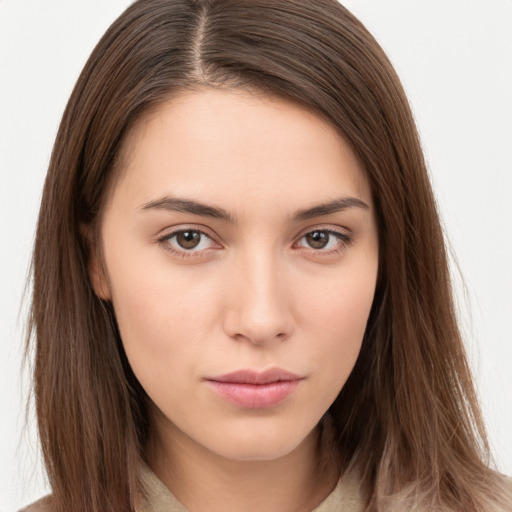 Neutral white young-adult female with long  brown hair and brown eyes