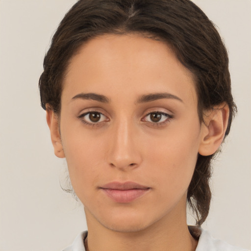 Neutral white young-adult female with medium  brown hair and brown eyes