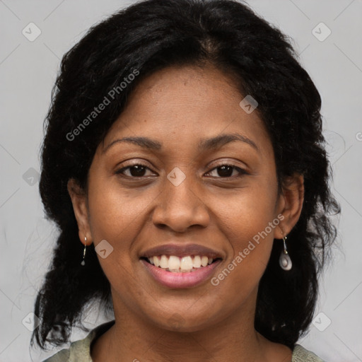 Joyful black young-adult female with medium  brown hair and brown eyes