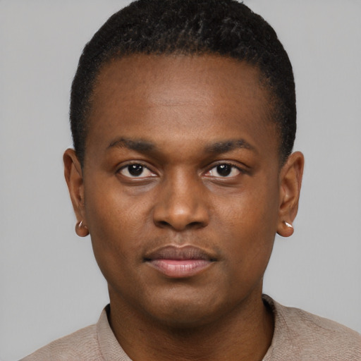 Neutral black young-adult male with short  brown hair and brown eyes