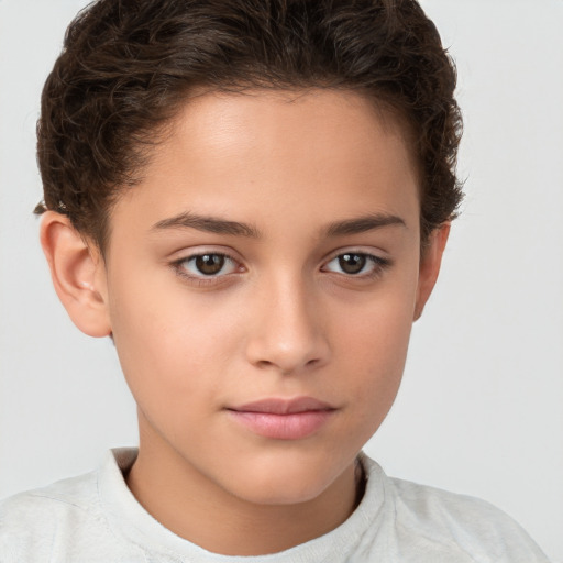 Joyful white child female with short  brown hair and brown eyes