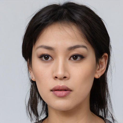 Neutral white young-adult female with medium  brown hair and brown eyes