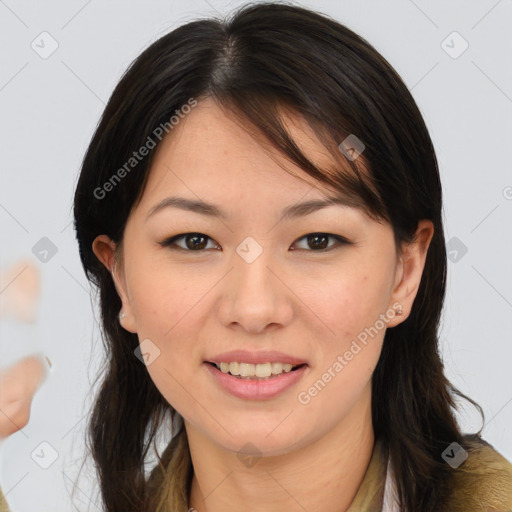 Joyful asian young-adult female with long  brown hair and brown eyes