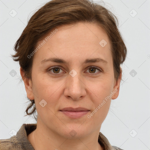 Joyful white adult female with short  brown hair and grey eyes