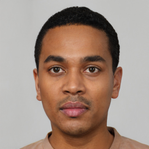 Neutral black young-adult male with short  black hair and brown eyes